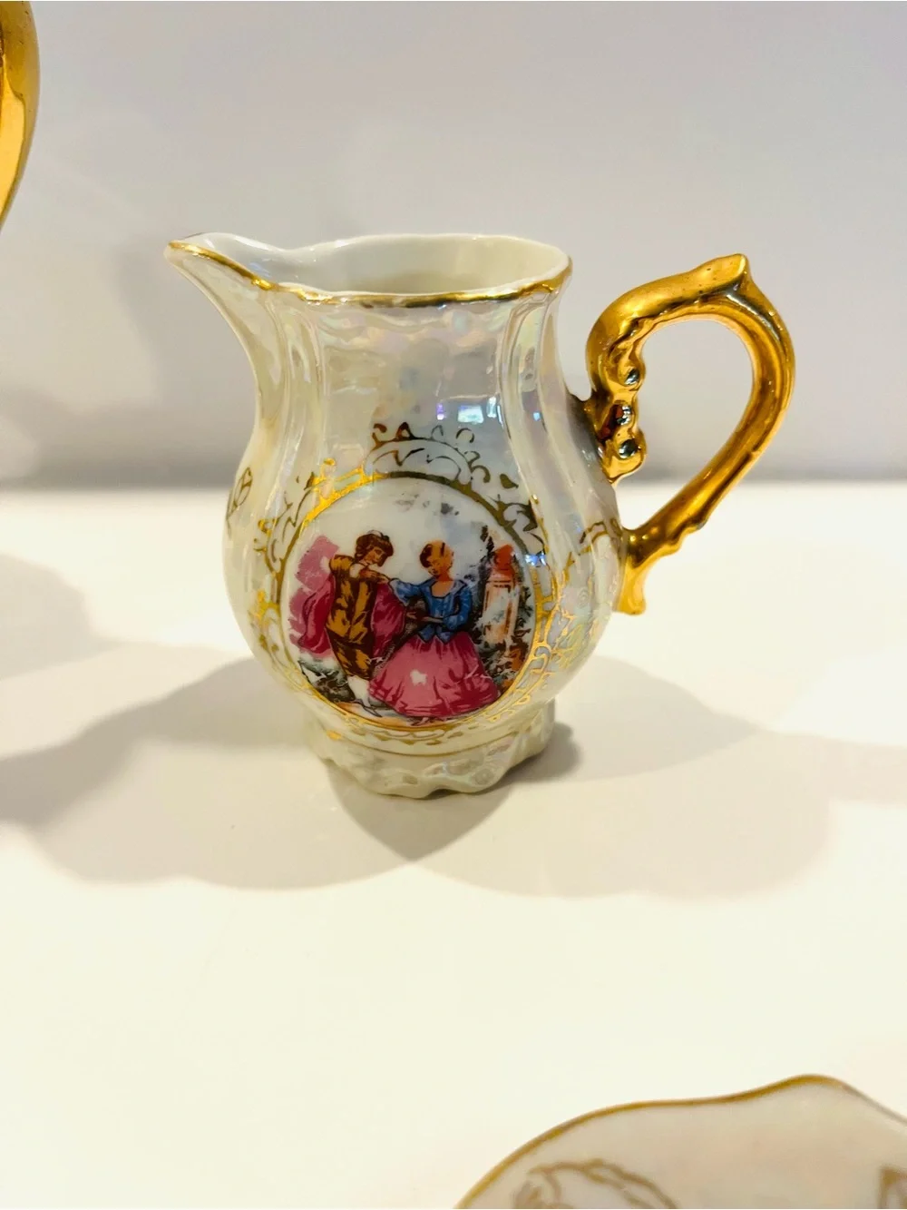 vintage porcelain tea service set from Japan features an iridescent finish